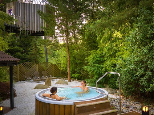 People relaxing in a jacuzzi